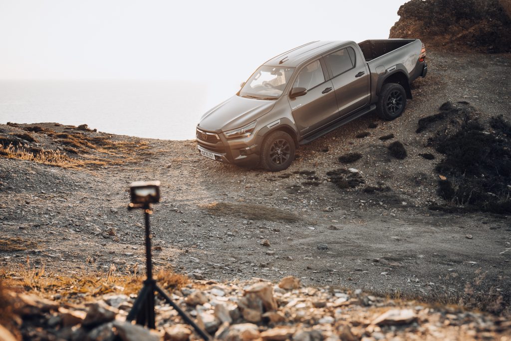 Film-maker Sam Werkmeister shows how to use a tripod to take moving footage of a Toyota Hilux. Photo credit: Laurie McCall
