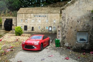 Model Mirai ‘fills up’ from newly installed hydrogen tanks outside the Motor Museum in the model village.