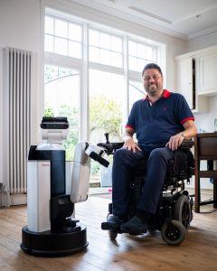 Anthony Walsh with the Toyota HSR robot