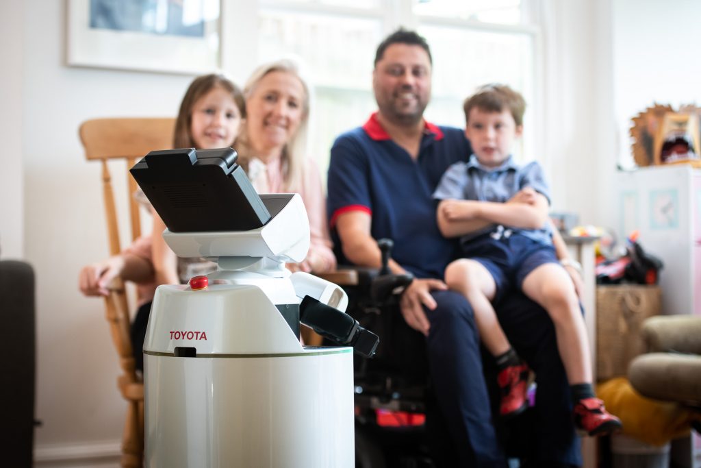 Anthony Walsh and his family meet the Toyota HSR robot
