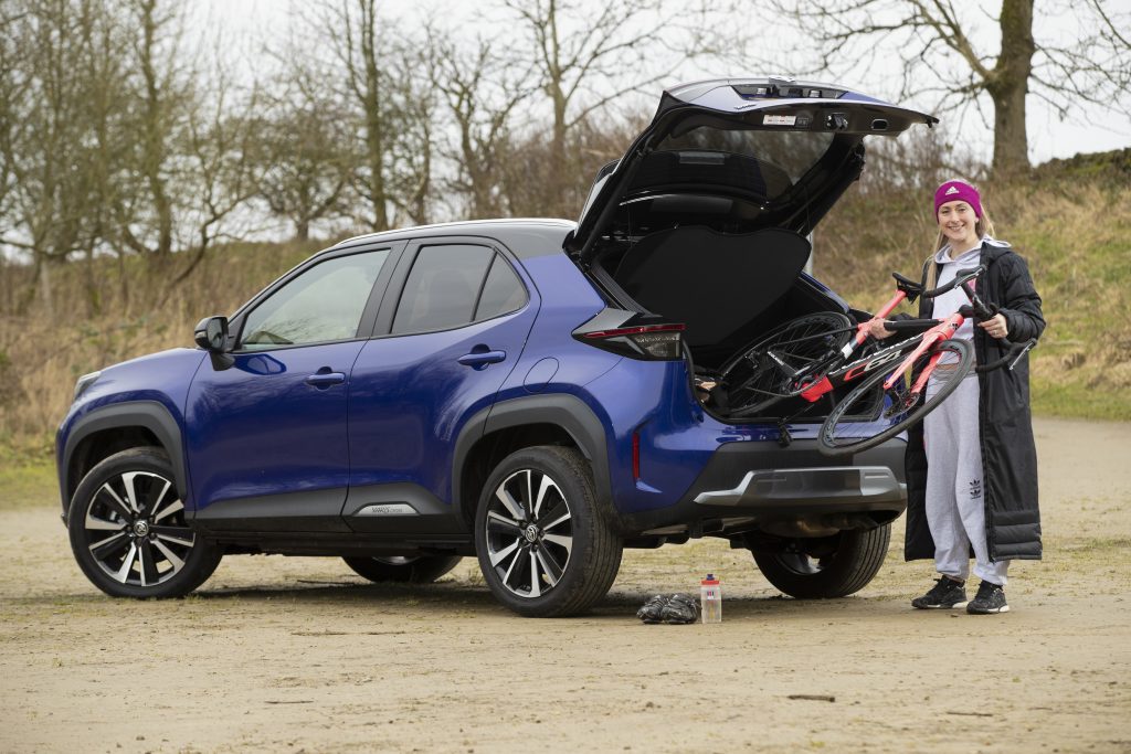 Dame Laura Kenny puts her bike in the back of her new Toyota Yaris Cross Compact SUV at Tegg's Nose Country Park, Macclesfield