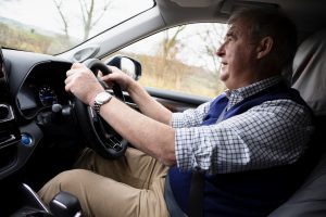 Peter Wright, The Yorkshire Vet, driving his hybrid Toyota Highlander.