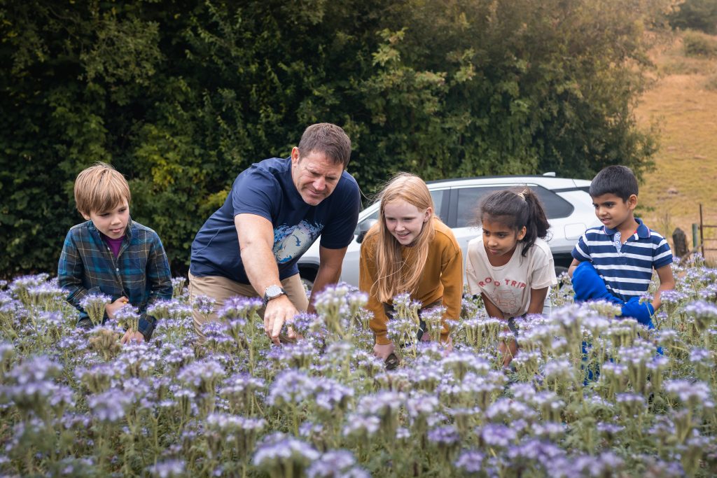 Steve Backshall introduces a group of children to adventures in nature.
