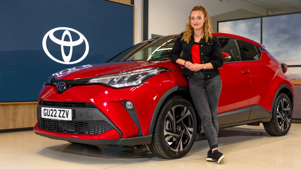 TV presenter Grace Webb with a Toyota C-HR Design hybrid.