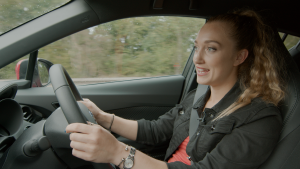 TV presenter Grace Webb, driving the Toyota C-HR Design.