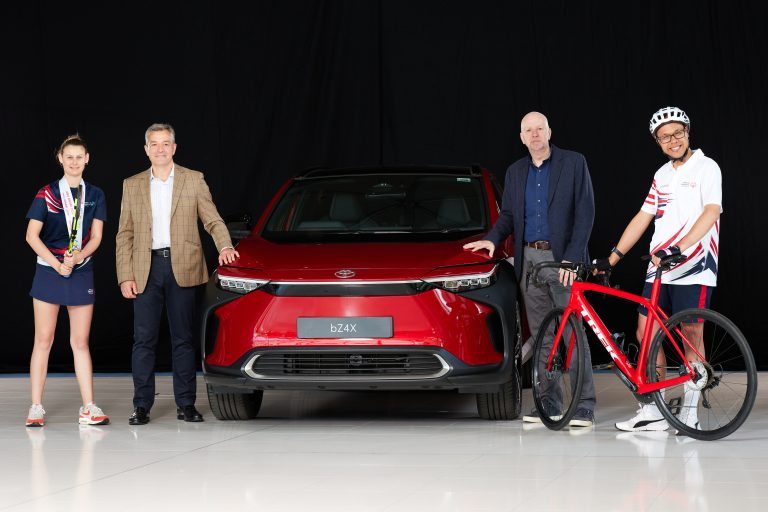 From L to R: tennis player Lily MiIls, Agustín Martín, Toyota (GB) President and Managing Director, Colin Dyer, Chief Executive of Special Olympics GB, and cyclist Dom Hsu, with the Toyota bZ4X all-electric SUV