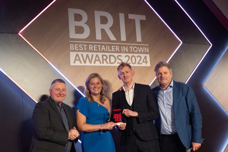 From L to R: Mark Roden, Toyota (GB) Operations Director, with winners of the Toyota Ichiban (Small Centre Award) - Helensburgh Toyota, Kirsteen McGuire, Sales Director, Tim Roome, Managing Director and TV presenter, Mark Durdan-Smith