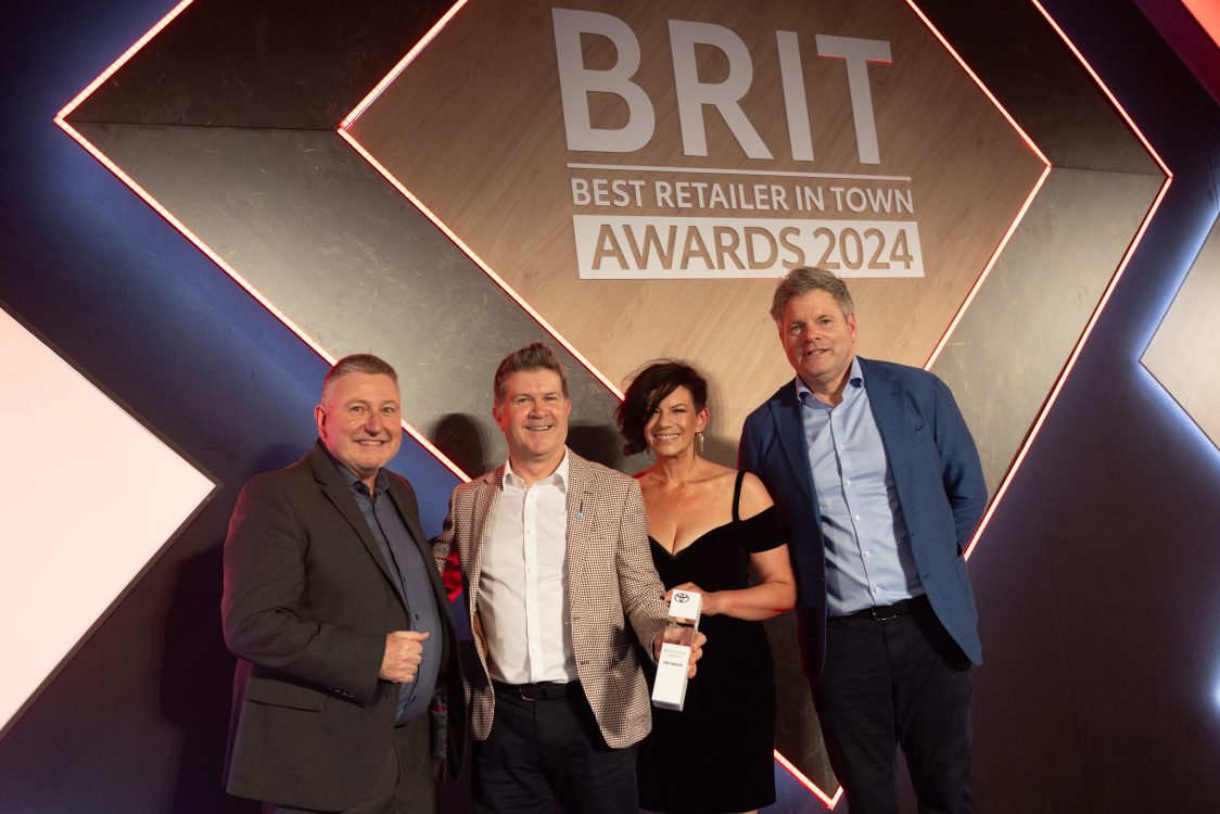 From L to R: Mark Roden, Toyota (GB) Operations Director, with winners of the Toyota Group of the Year award, FRF Group - Tim Horsley, After Sales Manager, Allison Dixon- Jenkins, Group Business Centre Manager, and TV presenter, Mark Durdan-Smith